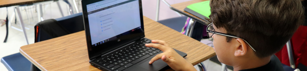 student on a chromebook student on a chromebook
